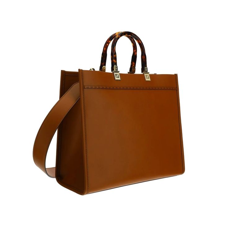 This Italian-crafted gem is both elegant and spacious, perfect for those who want a touch of luxury in their everyday life. With its stylish tortoiseshell-effect handles and versatile carrying options, it's a statement piece that doesn't sacrifice practicality. Whether you're heading to a meeting or a casual lunch, this bag fits right in. Features ROMA lettering and tortoiseshell-effect plexiglass handles Spacious leather-lined compartment Gold-finish metalware adds a luxurious touch Can be carr Fendi Sunshine Medium, Fendi Sunshine, Medium Bag, Leather Cap, White Rice, Mens Gloves, Beach Tote Bags, Shopper Bag, Handbag Shopping