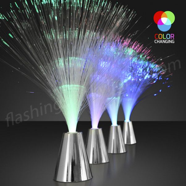 three silver vases with colorful lights in them on a black background and the words color changing