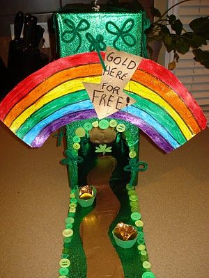 this is a st patrick's day decoration with a rainbow and pot of gold