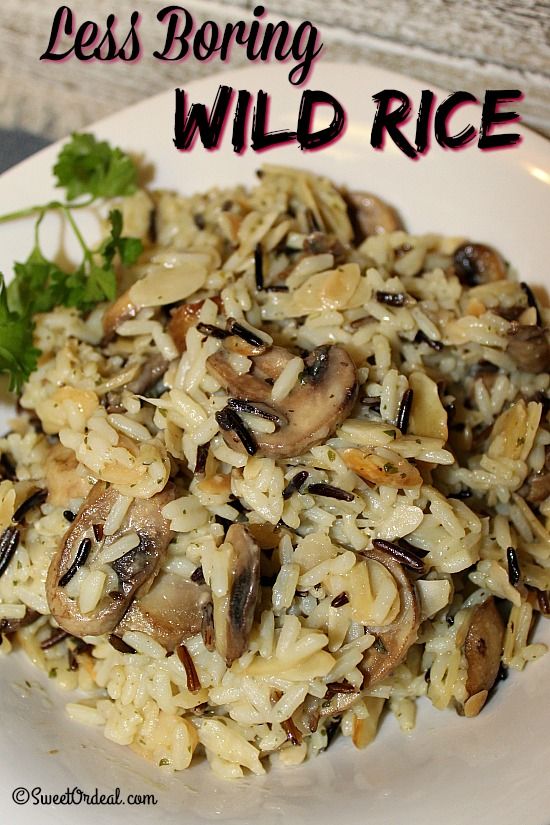 a white plate topped with rice and mushrooms