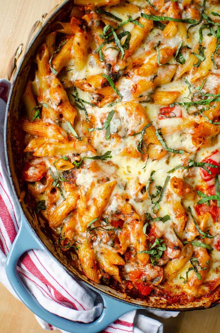 a casserole dish filled with pasta and cheese