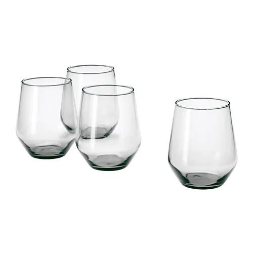 four wine glasses sitting next to each other