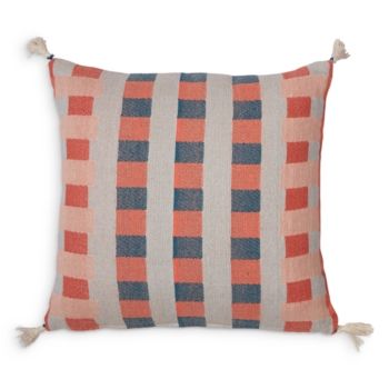 an orange and blue striped pillow with tassels on the edges, sitting on a white background