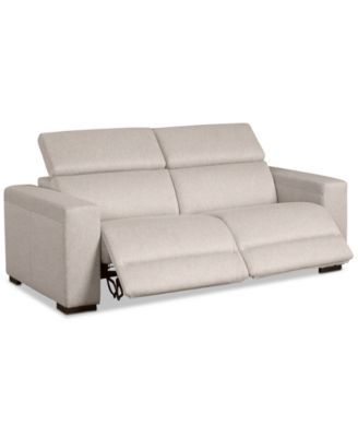 the reclining sofa with two seats and one arm rests on top of it's back