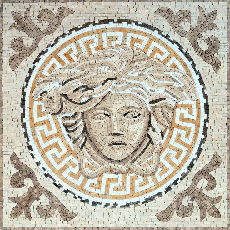 a mosaic with a woman's face in the center