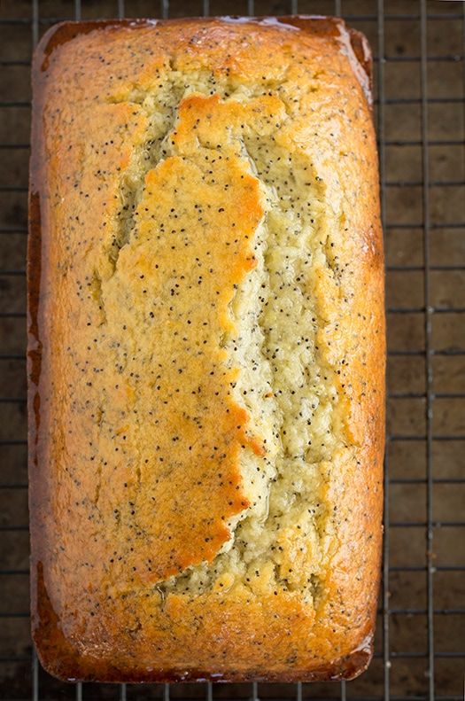 a loaf of bread sitting on top of a cooling rack