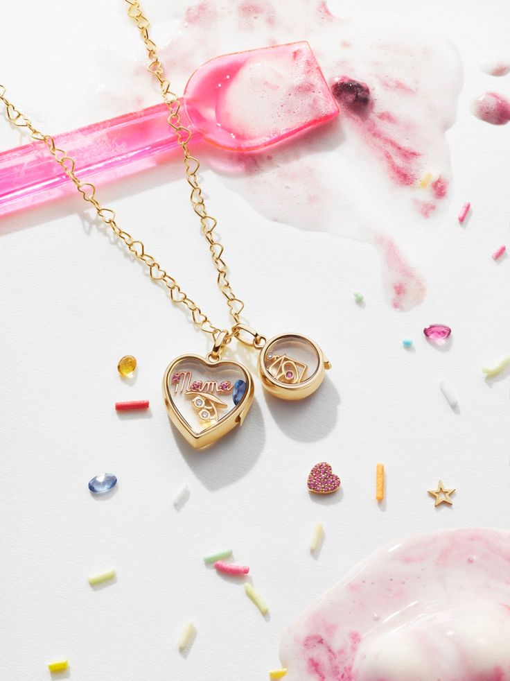 Loquet London specializes in creating joy and memories through handcrafted keepsakes. Using the most ardent care and sustainable practices, each token is hand-finished, so that it is utterly unique and made to last. Cast in 18K gold, the Home Is Where the Heart Is Charm is peppered with pink tourmaline and a singular diamond. Product Details 18K gold. Pink tourmaline and diamond. Care Instructions Do not wear in water. Clean with a dry lint-free cloth. For more thorough cleaning, use a professio Unique Gold Heart-shaped Jewelry, Unique Heart-shaped Gold Jewelry, Whimsical Gold Jewelry With Removable Charms, Whimsical Jewelry With Removable Charms For Gifts, Unique Gold Jewelry With Heart Charm, Anniversary Jewelry With Removable Heart Charms, Heart Pendant Jewelry With Removable Charms As Gift, Whimsical Gold Jewelry With Heart Charm, Gold Jewelry With Removable Charms For Valentine's Day