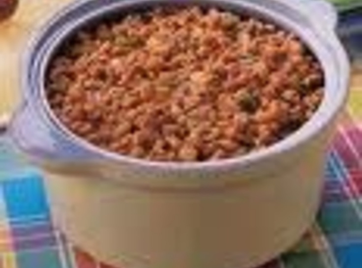 a close up of a bowl of food on a table