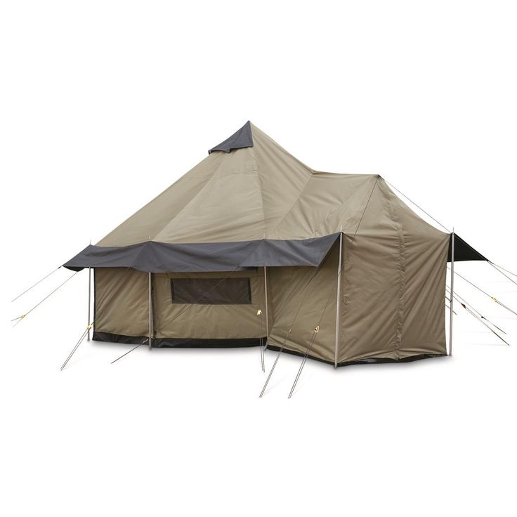 a tent that is set up on the ground with two poles in front of it