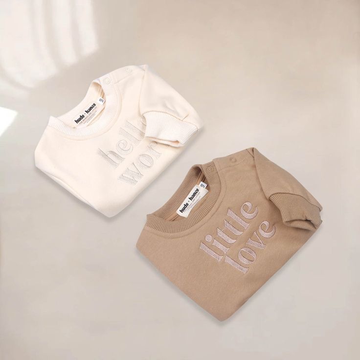 French Terry Cotton. Embroidered "little love" crewneck bubble sweatshirt romper with elastic neckline, legs, and cuffs. Snap button closure. True to Size Basic Cotton Bodysuit With Crew Neck, Cream Cotton Bodysuit For Loungewear, Cotton Onesie With Letter Print And Crew Neck, Cute Cream Cotton Bodysuit, Cotton Crew Neck Onesie With Letter Print, Cream Long Sleeve Cotton Onesie, Casual Long Sleeve Cream Onesie, Cute Cotton Onesie With Crew Neck, Cute Cotton Crew Neck Onesie