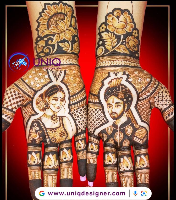 two hands with henna designs on them