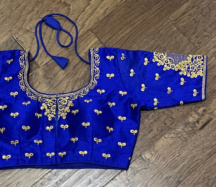 Beautiful Blue Silk Embroidery Blouse Size 34-42 Disclaimer : There might be little color variation because of photography and gadget settings, Zari Folding's and Thread Outcomes are not considered as Damage. For any questions please message +1 (832) 497-6149 Fitted Blue Blouse With Intricate Embroidery, Blue Fitted Blouse With Intricate Embroidery, Blue Embroidered Fitted Blouse, Fitted Embroidered Blue Blouse, Fitted Blue Embroidered Blouse, Blue Floral Embroidery Tops For Wedding, Blue Floral Embroidered Tops For Wedding, Festive Embroidered Blue Blouse, Blue Embroidery Blouse