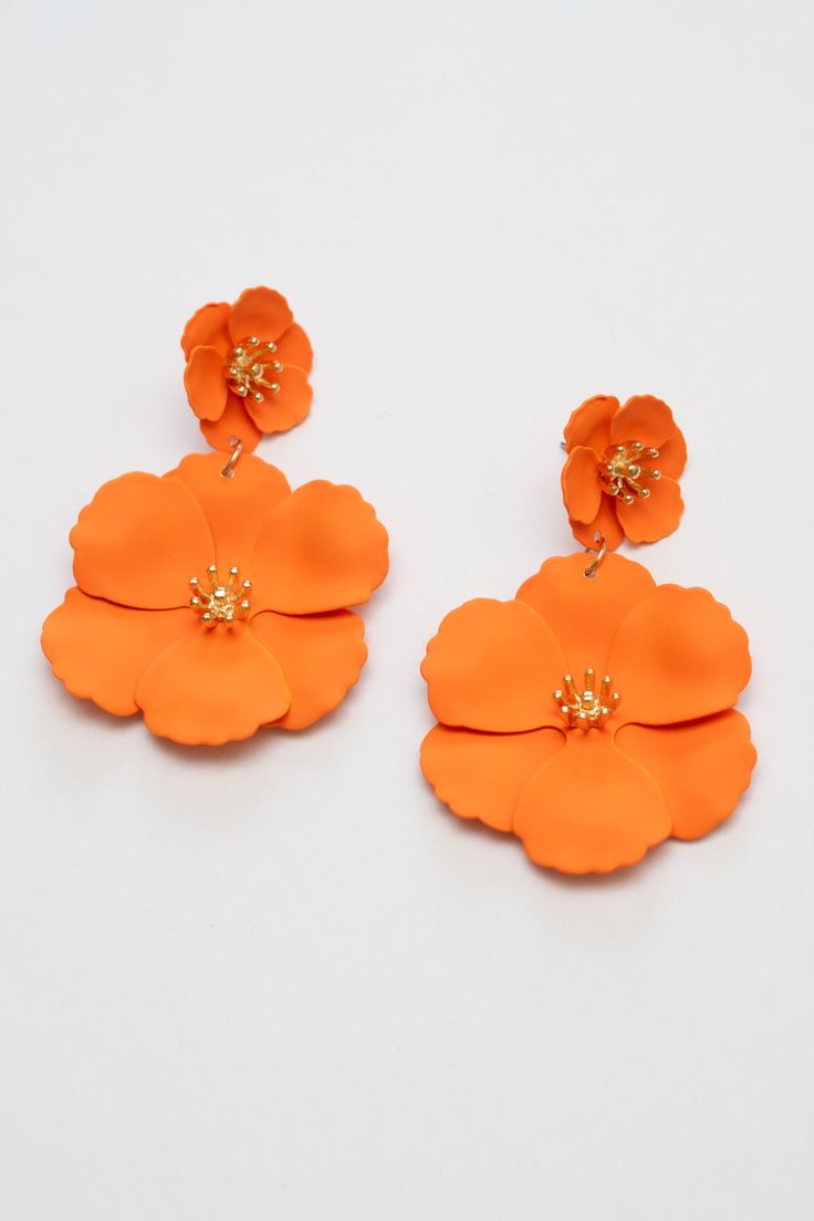 Ditch the boring studs! These bright enamel flower drop earrings are a celebration of your fun-loving side. Like a burst of confetti, they'll make your outfit pop with pure joy. Lightweight and comfortable for all-day wear. Fun design adds a playful touch to any outfit and makes a statement Push back posts Materials : Alloy, Enamel, Hypoallergenic Surgical Steel Posts Dimensions: Hangs approximately 2.75", width 1.5" Ships in a branded jewelry pouch and recycled paper box, perfect for gift givin Orange Drop Earrings For Spring, Trendy Orange Flower Earrings As Gift, Orange Earrings For Spring Gift, Spring Gift Orange Earrings, Orange Flower Earrings For Spring, Orange Flower Shaped Earrings For Party, Orange Flower Earrings For Party, Los Angeles Shopping, Flower Drop Earrings