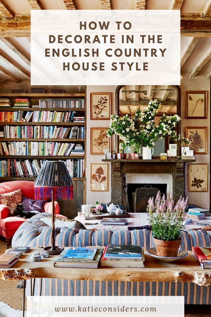 an english country house style living room with striped furniture and bookshelves in the background