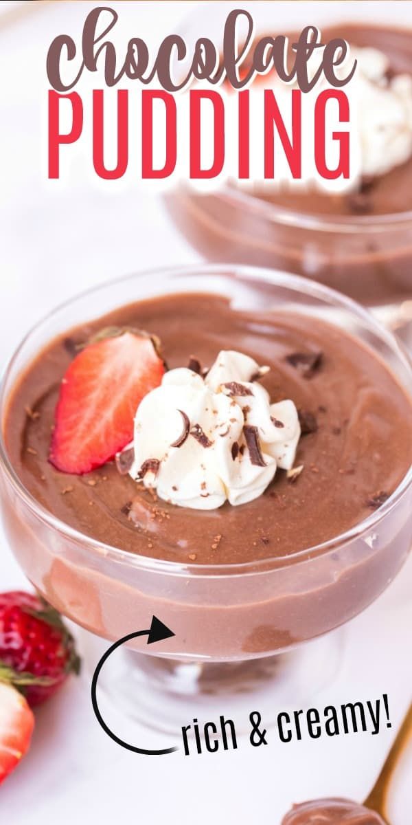 chocolate pudding with whipped cream and strawberries on top