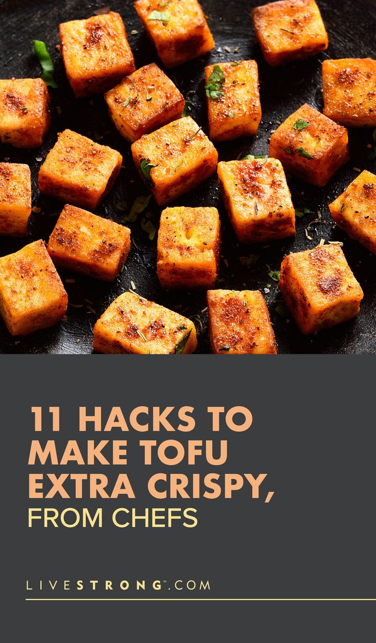 some tofu cubes in a frying pan with the title 11 hacks to make tofu extra crispy, from chefs