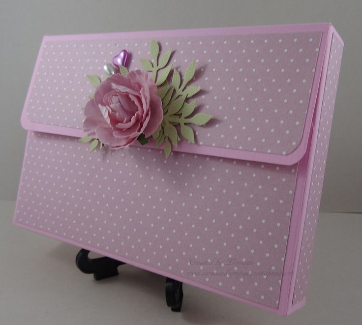 a pink card box with a flower on it