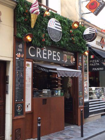 an outside view of a restaurant called crepes