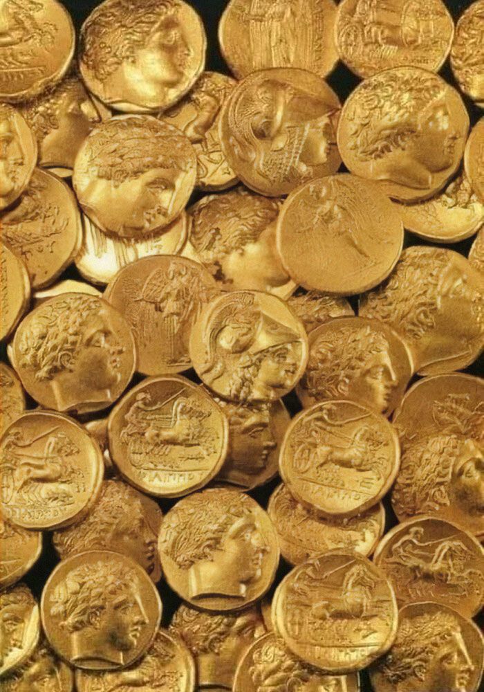 gold coins are shown in this close up photo