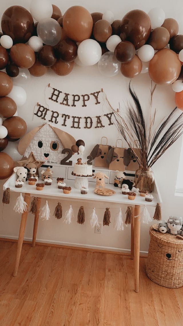 a birthday party with balloons and decorations