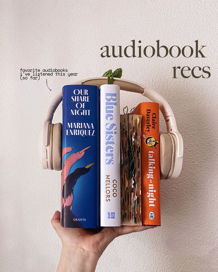 a person is holding several books and headphones on their shoulders, with the words audiobook recs above them