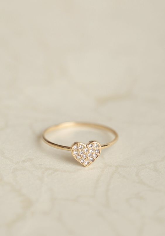 Pavé Diamond Baby Heart Ring $495.00 Valentine's Day Single Diamond Ring In Fine Jewelry Style, Dainty Heart Ring With Heart Charm, 14k Gold Stackable Rings With Heart Charm, Dainty Rose Gold Heart Ring With Cubic Zirconia, Heart Ring With Single Diamond In Round Cut, Dainty Wedding Ring With Pave Setting, Heart Cut Diamond Rings With Single Cut Diamonds, Valentine's Day Heart Ring With Single Diamond, 14k Heart Cut Diamond Ring For Valentine's Day