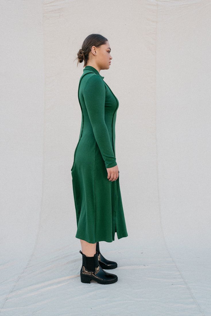 [meet me by our favorite fountain after two]Strut your stuff! The Ada in forest green is a long-sleeved, mock neck dress that is figure-hugging at the top and relaxed fitting from the waist down; with inviting two-way slits. This dress gives you a comfortable fit in all the right places, highlighting exposed seams with a stretch that is oh so cozy! •Mockneck collar•Super flattering fit•Slits in front and back•Exposed seams•Super cozy stretchAmari is 5'9", dress size 10, wearing a size L. Elle is Exposed Seams, Mock Neck Dress, Large Bust, Small Bust, Fit In, Forest Green, The Struts, Mock Neck, Vintage Shops