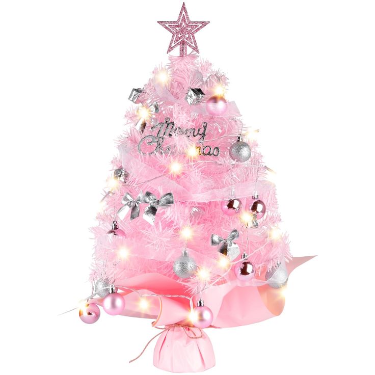 a pink christmas tree with lights and decorations