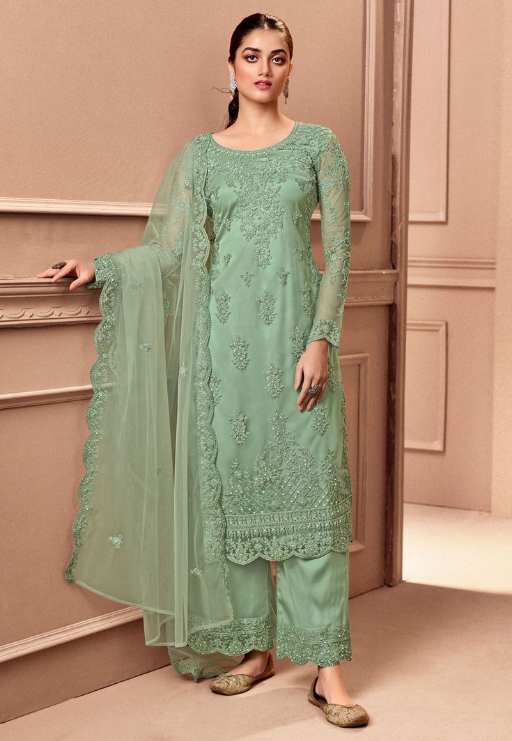 Pista green net palazzo suit 3502 Desc: Style : Pakistani Salwar Kameez Color : Pista Green Fabric : Net Work : Embroidery Diamond Wash Care : Dry clean Sleeve Style : Full Sleeve Long Sleeves : Done only in Custom Stitch Sleeves Lining : Done only in Custom Stitch Bust Size : 32 to 42 Inches Occasion : Wedding Mehendi Sangeet Reception Lohri Gudi Padwa. With Express Free Shipping Buy Indian Party wedding wear bridal Anarkali Salwar Pista green net palazzo suit 3502 online in USA, UK and Canada Mint Green Pants, Plazzo Suits, Celana Fashion, Indian Salwar Kameez, Palazzo Suit, Salwar Kameez Online, Pakistani Salwar Kameez, Embroidered Pants, Party Kleidung