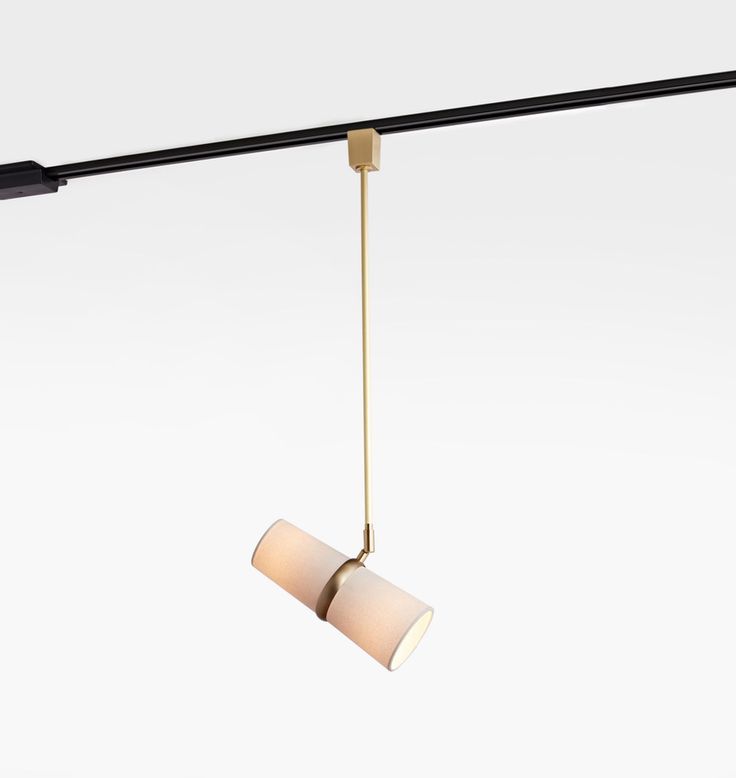 two lamps hanging from a long black pole