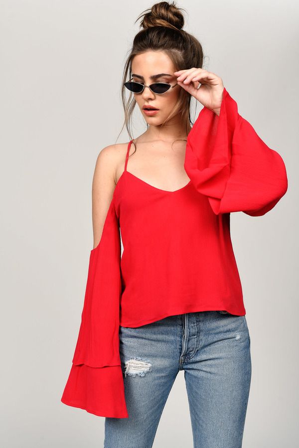 With Wide, Double Layer Sleeves, You Won'T Be Able To Resist Making Shapes With The Red Jillian Cold Shoulder Blouse. A Peasant Blouse You Can Wear In The Evening, The Backless Blouse Has Deep Cold Shoulder Cutouts And Delicate Shoulder Straps, With Ties At The Back. Live The Drama. Trendy Cold Shoulder Summer Blouse, Long Sleeve Blouse With Elastic Shoulders For Summer, Spring Long Sleeve Off-shoulder Top With Elastic Shoulders, Spring Off-shoulder Long Sleeve Top, Fall Off-shoulder Blouse With Blouson Sleeves, Off-shoulder Blouse With Blouson Sleeves For Fall, Fall Blouse With Blouson Sleeves And Off-shoulder Design, Flowy Long Sleeve Party Tops, Summer Off-shoulder Top With Blouson Sleeves