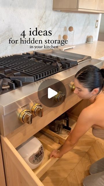 a woman is opening the oven door to check on what's cooking in it