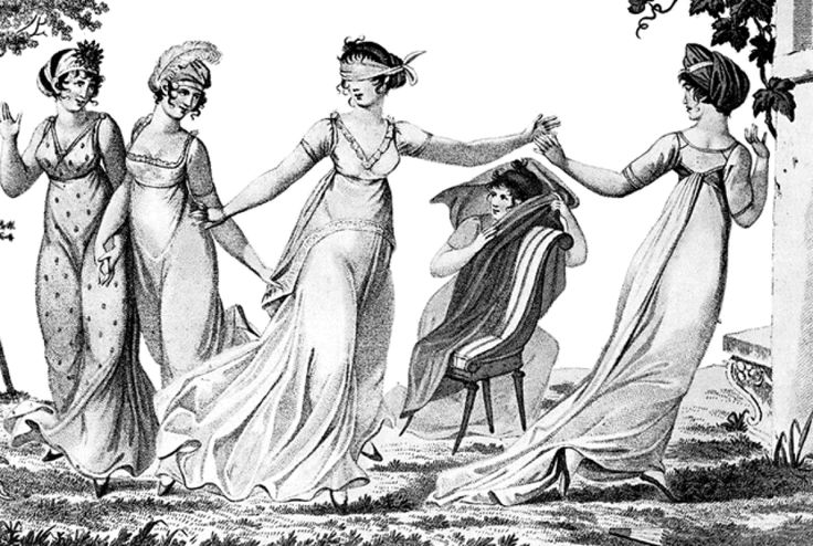 four women in dresses are standing near a tree