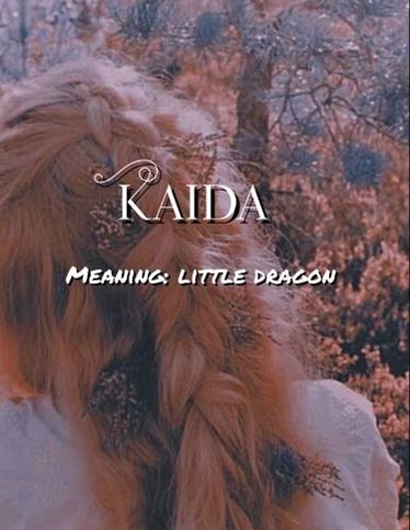 a woman with long hair standing in front of trees and bushes, text reads kadia meaning little dragon