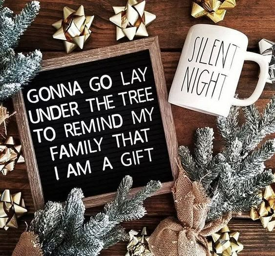 a sign that says, go lay under the tree to remind my family that i am a gift