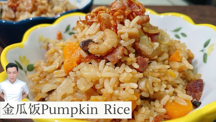 two bowls filled with rice and meat on top of a table