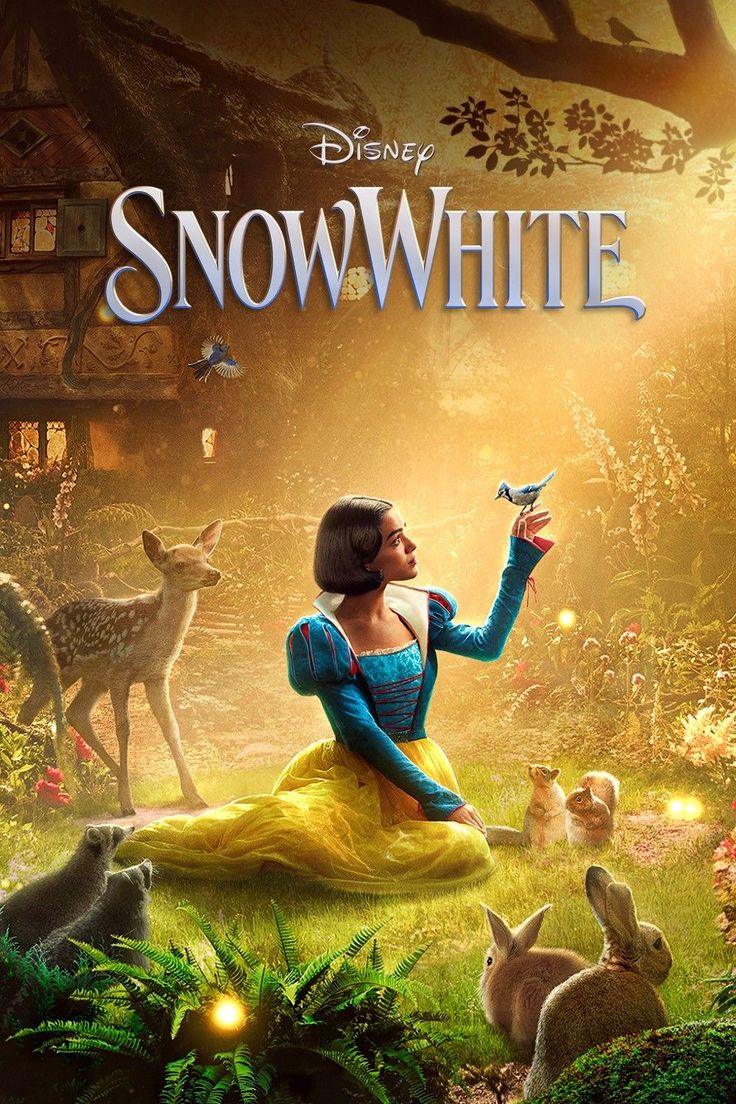 snow white sitting on the ground surrounded by rabbits