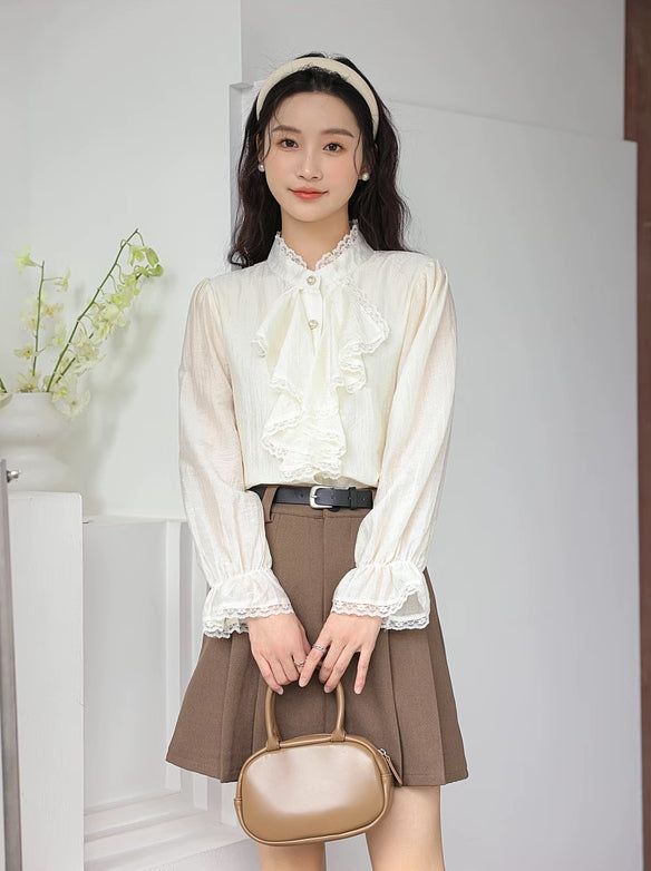 Chiffon blouse with a button down front lined with pearl buttons, ruffled Victorian front, frilly cuffs and lace trims all over. S: 14" across shoulders, 36" chest, 23" lengthM: 14.5" across shoulders, 37.5" chest, 23" lengthL: 15" across shoulders, 39" chest, 23" length Lace Button-up Blouse With Lace Cuffs, Button-up Blouse With Lace Trim For Work, Long Sleeve Lace Trim Blouse For Work, Classic Fall Blouse With Lace Cuffs, Lace Blouse With Button Closure For Work, Long Sleeve Lace Blouse With Button Closure, Button-up Blouse With Lace Cuffs For Work, Lace Blouse With Lace Cuffs For Work, Workwear Button-up Blouse With Lace Cuffs