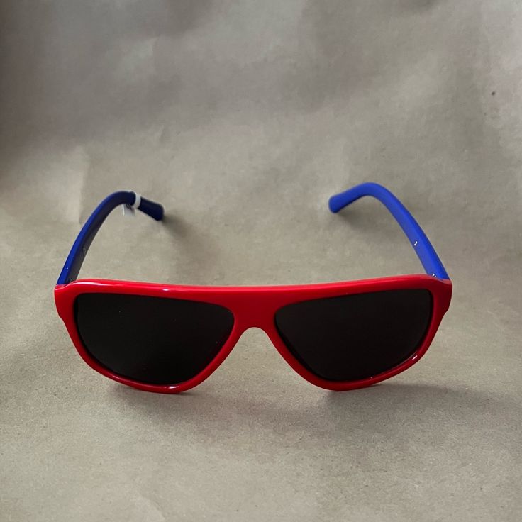 Red And Blue Retro Sunglasses. Arrows On Each Arm. New With Tags. Red Sunglasses With Uva Protection For Beach, Red Wayfarer Sunglasses For Summer, Red Sunglasses With Uva Protection, Casual Multicolor Glass Sunglasses, Red Plastic Sunglasses For Summer, Trendy Red Wayfarer Sunglasses, Red Plastic Sunglasses With Uva Protection, Casual Red Wayfarer Sunglasses, Red Glass Sunglasses For Summer