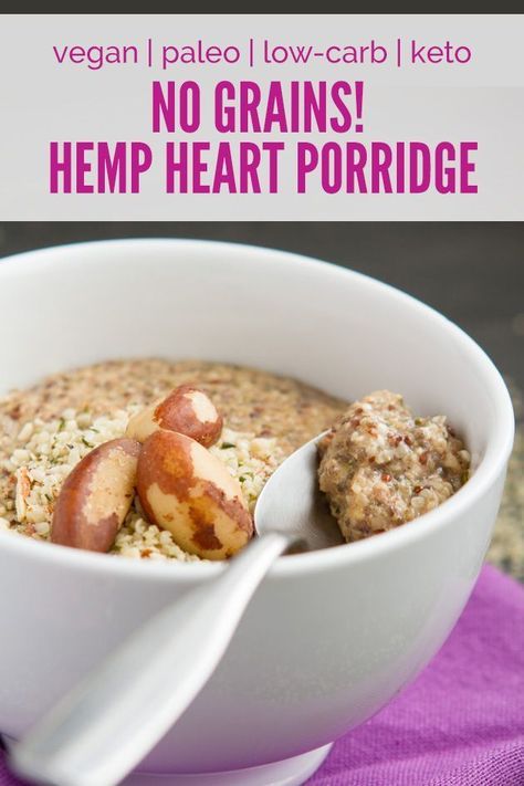 a white bowl filled with oatmeal and fruit on top of a purple towel