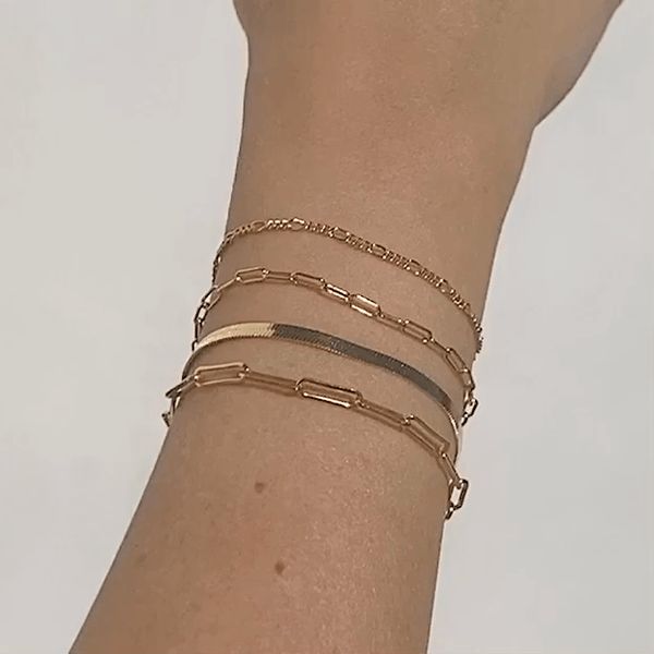 A delicate gold Figaro chain bracelet bracelet. Wear on its own or layer with our Paperclip bracelet. This Figaro bracelet makes for the perfect layering piece. BUY 2, GET 1 FREE. Coupon applied at checkout. - Width: 1.3 mm. - Adjustable chain 6 to 8 in.- Shower safe / Tarnish resistant / Hypoallergenic- Made in gold vermeil: a thick 18k gold layer on sterling silver.- 1 Year warranty Minimalist Delicate Chain Bracelet For Layering, Tarnish Resistant Chain Bracelet For Layering, Gold Plated Bracelets With Paperclip Chain, Minimalist Stackable Chain Bracelet For Layering, Minimalist Gold Charm Bracelet With Delicate Chain, Layering Bracelets With Delicate Chain, Layering 14k Gold-filled Yellow Gold Bracelets, Minimalist Yellow Gold Chain Bracelet For Layering, Gold Tarnish-resistant Bracelets For Layering