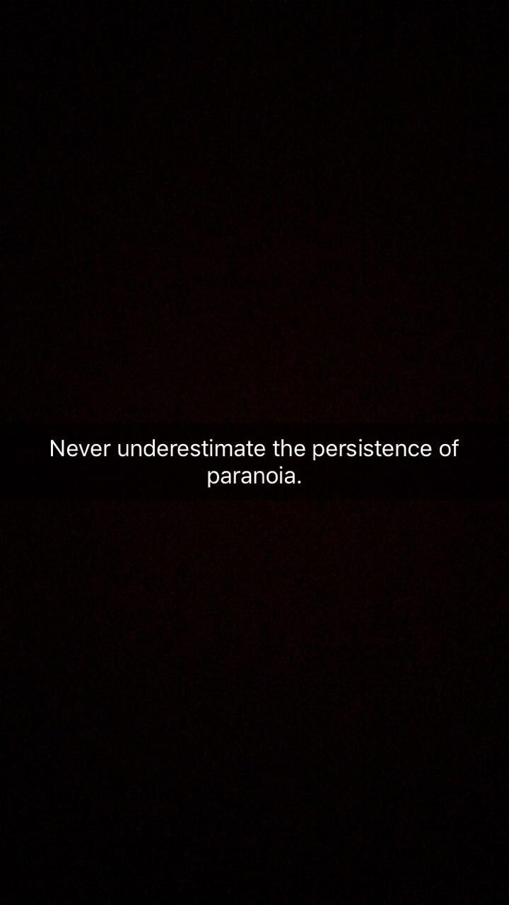 a black background with the words never underestimate the presence of paranoia