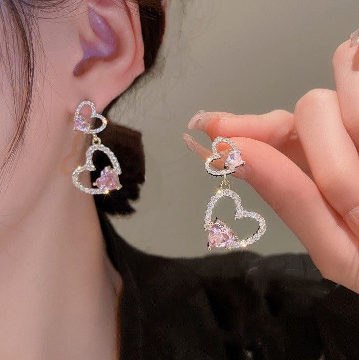 Pink Crystal Heart Earrings Elevate your look with these lovely Pink Crystal Heart Earrings. Adorned with sparkling pink crystals, these earrings are the perfect touch of sweetness for any outfit. Show off your cute side with these adorable and charming earrings. Pink Love Heart, Crystal Heart Earrings, Sweet Earrings, Wedding Earrings Drop, Alloy Earrings, Heart Drop Earrings, Rhinestone Heart, Birthday Jewelry Gift, Body Chain Jewelry