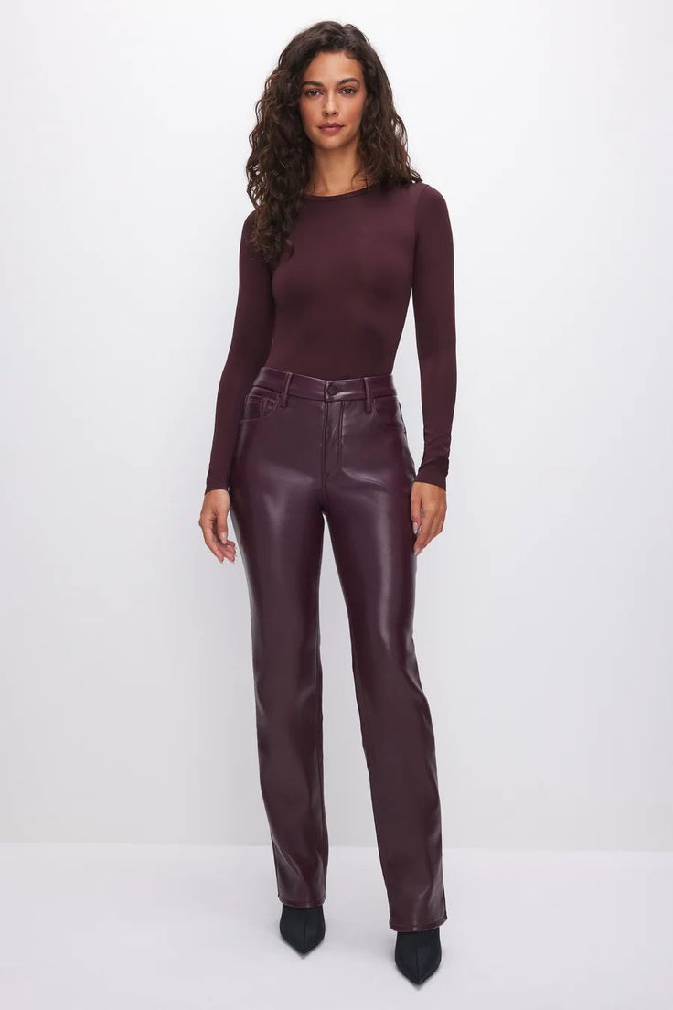 This is the straight pant of your dreams. Pairs perfectly with heels, fitted through the hips, with an iconic straight leg opening. Your everyday straight, now in our fan favorite Better Than Leather material. Straight leg High Waist Better Than Leather material - thick faux leather Burgundy color Heavy weight fabric- our thickest faux leather is structured and ultra luxe Inseam: 32" Fabric: 100% Polyurethane Care: Dry Clean Best Icons, Leather Pant, Perfect Pant, Faux Leather Pants, Malbec, Nice Leather, Good American, Burgundy Color, Pair Of Pants