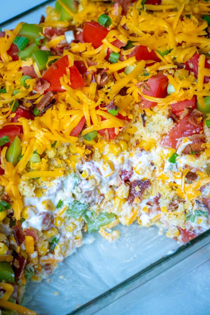 a casserole dish with lots of cheese and vegetables