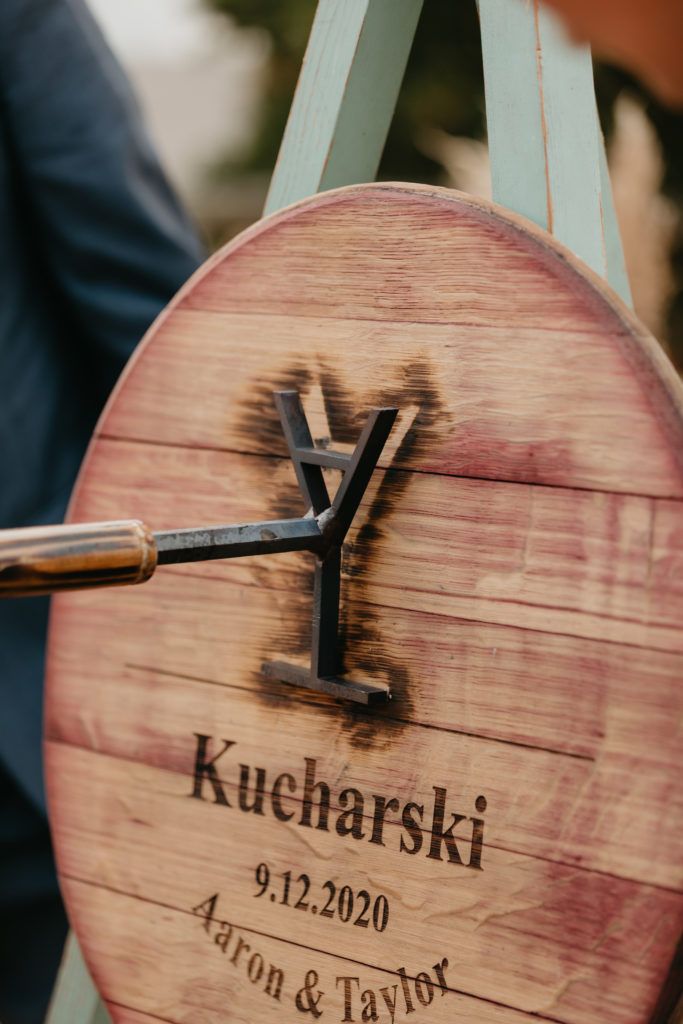 a close up of a wooden barrel with a clock on it