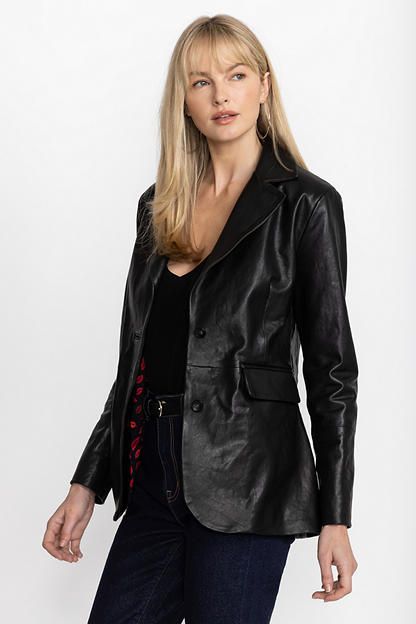 The Italian leather blazer offers a fresh feminine take on a classic masculine suiting jacket. Crafted from 100% Italian leather, this blazer features a wide, notched lapel, button closure, and detailed flap pockets at the hip. Layer over a bold blouse and pair with flowing silk pants for a unique textured look. Johnny Was Women's Italian Leather Classic Blazer in Black, Size XS, Silk/Leather Black Leather Jacket With Notch Lapel, Tailored Black Leather Jacket With Notch Lapel, Tailored Black Leather Blazer, Leather Single Breasted Blazer For Night Out, Leather Single-breasted Blazer For Night Out, Fall Leather Jacket With Notch Lapel For Night Out, Chic Leather Outerwear For Semi-formal Events, Chic Semi-formal Leather Outerwear, Sleek Black Leather Blazer