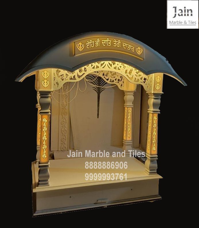 an intricately designed gazebo with gold trimmings