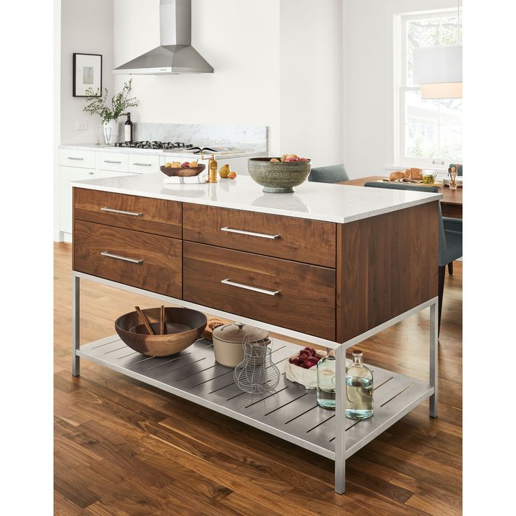 a kitchen island with two bowls on it