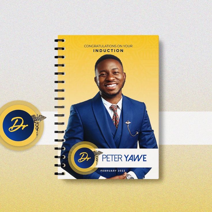 a spiral notebook with a photo of peter yawe on it